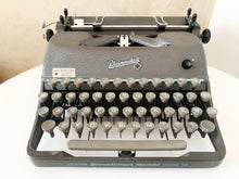 Load image into Gallery viewer, Typewriter Grey Rheinmetall Portable - Writes like a dream