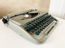 Load image into Gallery viewer, 1950's Groma Kolibri Typewriter - Working and good looking - With Original Leather Case