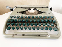 Load image into Gallery viewer, 1950&#39;s Groma Kolibri Typewriter - Working and good looking - With Original Leather Case
